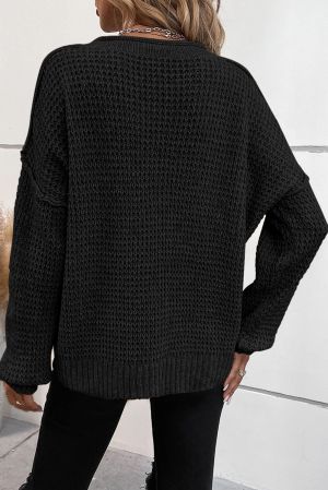 Дамски пуловер в черен цвят с ефектно деколте с копчета