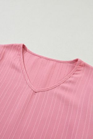 Дамска блуза в розов цвят, с широки ръкави и ефектна текстура
