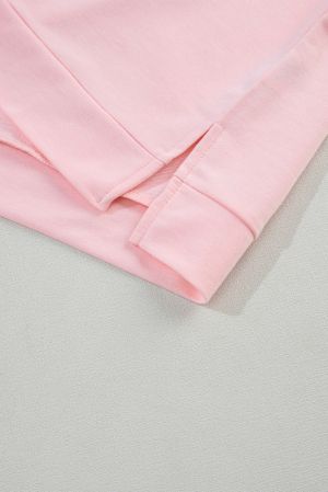 Дамска блуза в розово с къси бухнали ръкави и V-образно деколте