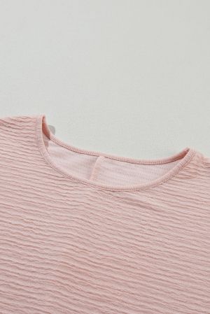 Дамска блуза в розово, с къс ръкав и ефектна текстура