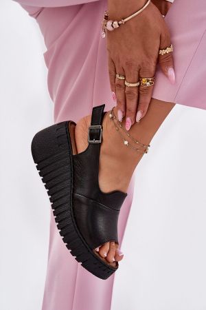 Black natural leather women’s sandals with practical black sole and comfortable platform