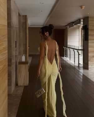 Yellow Open-Back Maxi Dress with Thin Straps and Ruffle Detail