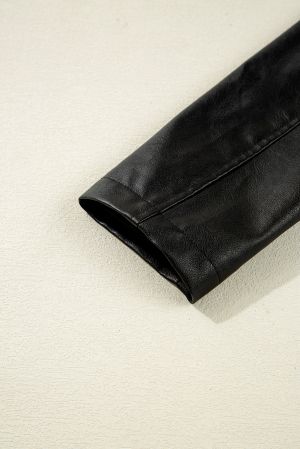 Дамско черно яке от еко кожа с копчета и свободна кройка