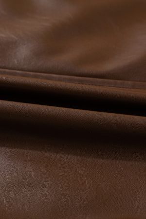 Дамско кафяво яке от еко кожа с копчета и връзки при подгъва