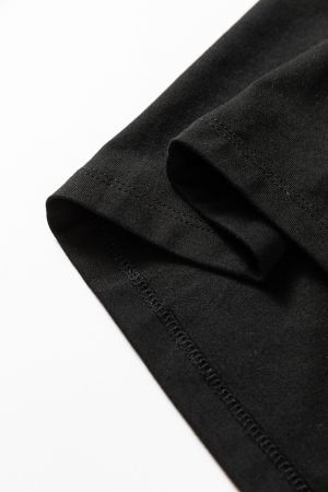 Дамско черно вталено поло от еластична материя