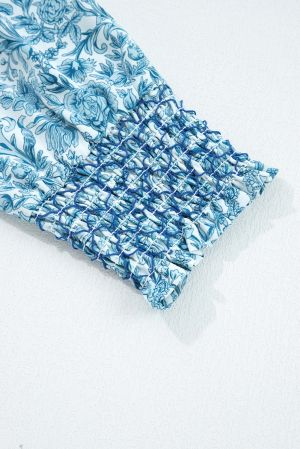 Дамска светлосиня риза с флорален принт и обемни ръкави