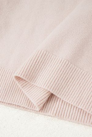 soft beige knit sweater fabric texture detail