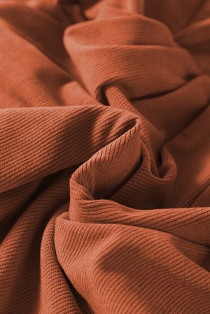 Soft lightweight fabric of cinnamon dress detailed view