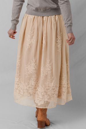 Women's long beige skirt with floral embroidery