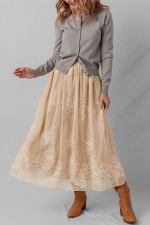 Women's long beige skirt with floral embroidery