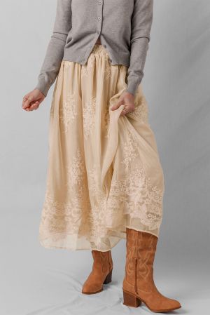 Women's long beige skirt with floral embroidery