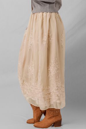 Women's long beige skirt with floral embroidery