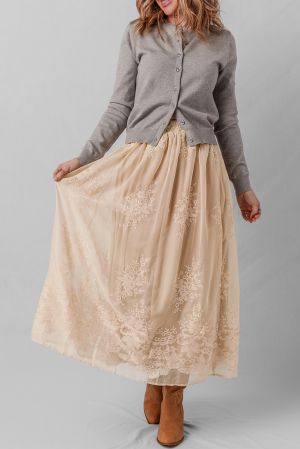 Women's long beige skirt with floral embroidery
