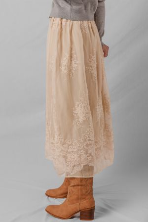 Women's long beige skirt with floral embroidery