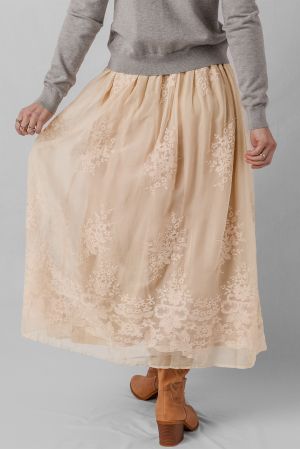 Women's long beige skirt with floral embroidery