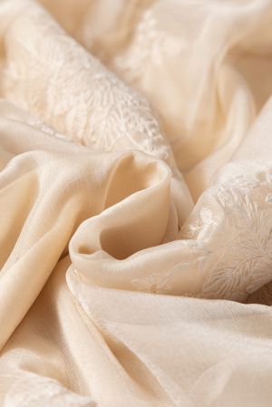 Women's long beige skirt with floral embroidery