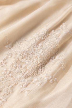 Women's long beige skirt with floral embroidery