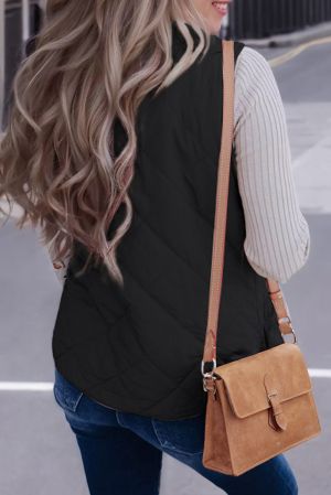 Women’s Reversible Vest with Quilted and Sherpa Sides in Black and White