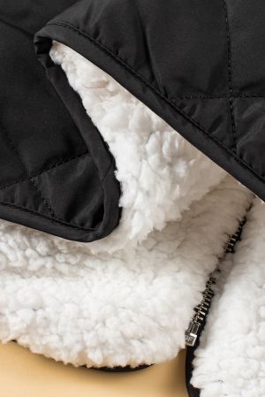 Women’s Reversible Vest with Quilted and Sherpa Sides in Black and White