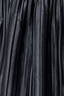 Дамска плисирана пола в черно
