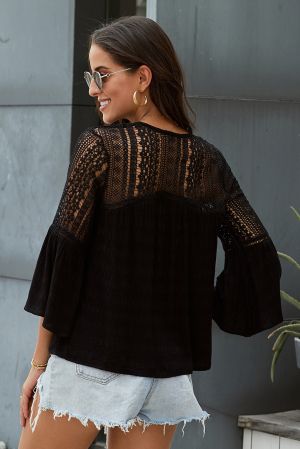 Елегантна дамска блуза в черно с дълъг ръкав и ефектна бродерия