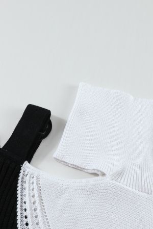 Ефектен дамски пуловер в черно и бяло