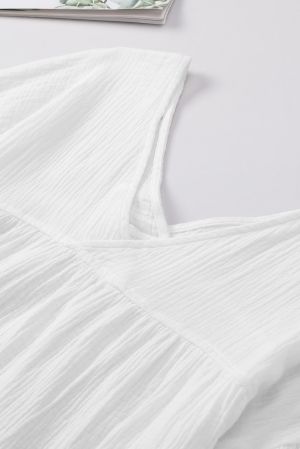 Дамска памучна блуза в бяло с V-образно деколте и гръб