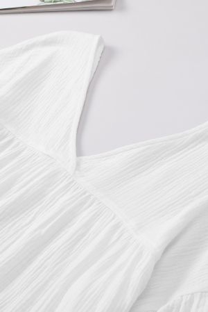 Дамска памучна блуза в бяло с V-образно деколте и гръб