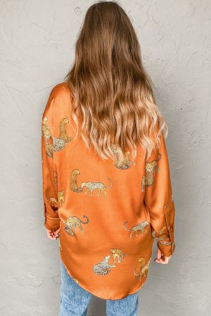 Дамска сатенена риза в оранжево с дълъг ръкав и принт гепард