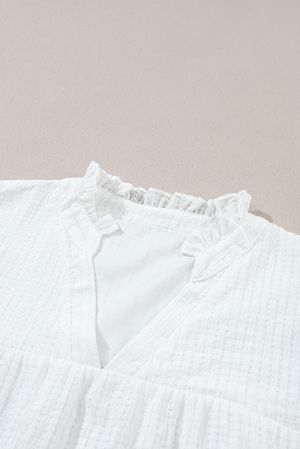 Дамска блуза в бяло с къси бухнали ръкави и бродерия с флорален мотив