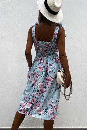 Дамска рокля с флорален десен и ефектни презрамки