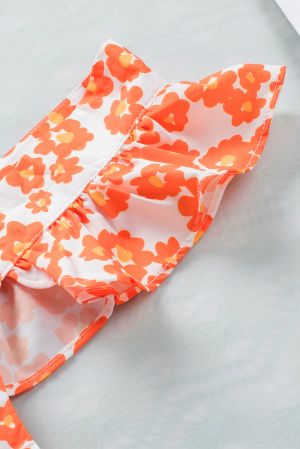 Дамски топ в оранжево с принт на цветя и къдрички при раменете
