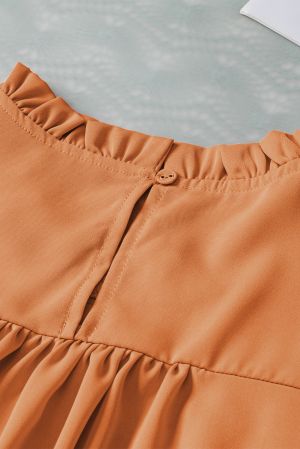 Дамски топ в оранжев цвят с ефектни къдрички