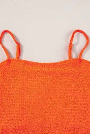 Дамски къс топ в оранжево с ефектни пискюли